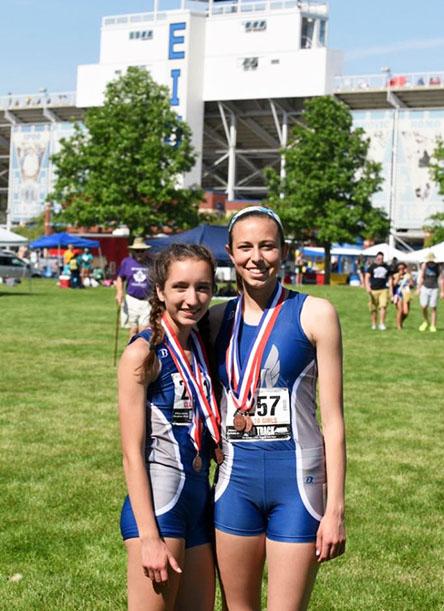 Lauren Katz (right) and Jordyn Bunning (left) pose for a picture at the state track meet, held at Eastern Illinois University. 