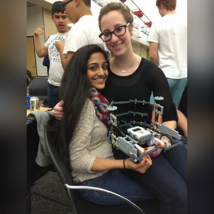 Lexi Floom (11) and Aparajitha Adiraju (11) together with their robot.