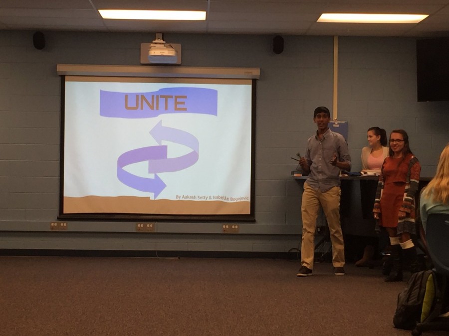 Aakash Setty (11) and Isabelle Bogojevic (11) introduce their idea of an app that tracks student service hours