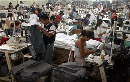 People work in a maquiladora, or garment assembly plant, in Tehuacan, Mexico, in a file photo.  


REUTERS/Jennifer Szymaszek