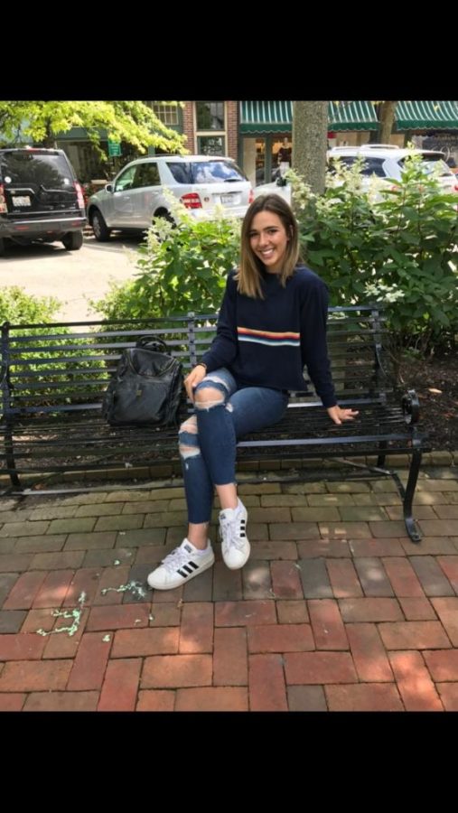 This is Rachel Levy sitting on a bench