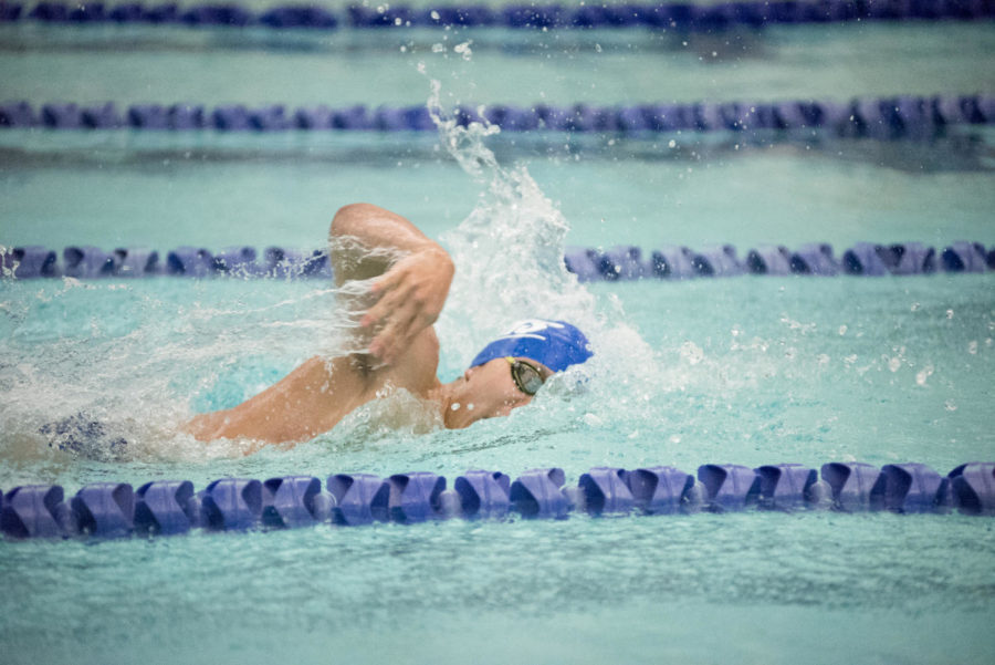 Calvin Yoon swims the 50-yard freestyle
