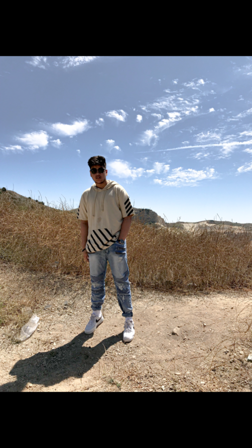 Pavan Patel posing in the hills.