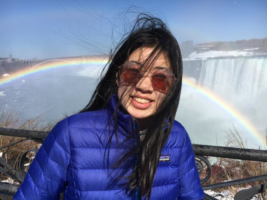 Erin Kim poses in front of Niagara Falls.