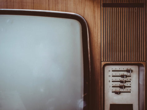 A close up photo of an old-fashioned television