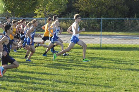 Image showing David Rzepa leading in first place at a meet.