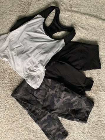 A photo of leggings and other workout clothes.