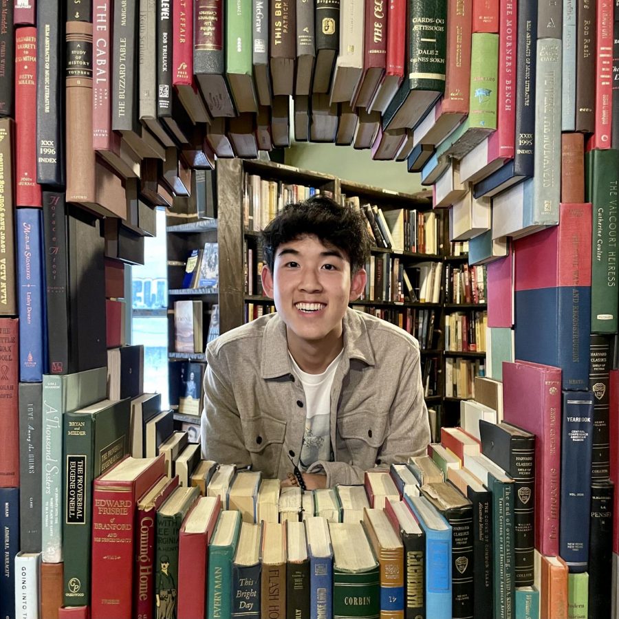 Evan poses inside a book ring in The Last Bookstore, LA.