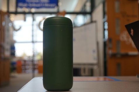 Mr. Smith sports a green insulated water bottle to keep his water chilled throughout the day