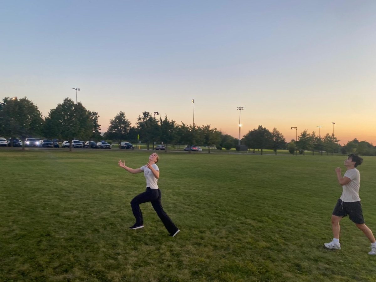 This is highschooler Jamie Gold who is practicing on the VHHS football field for Powderpuff attempting to catch a ball