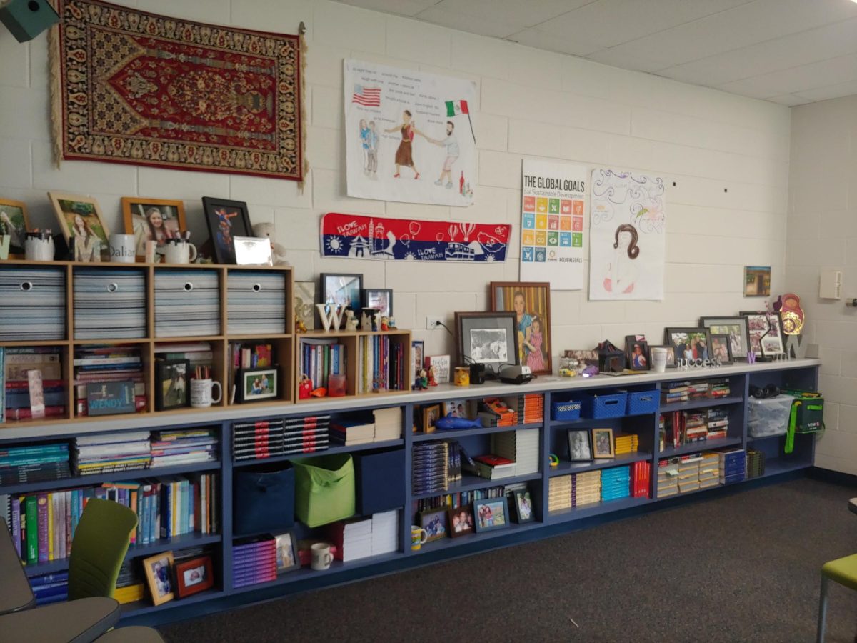 Wendy Meister-Louria decorated her classroom with family pictures and worldwide items to show comfort and value in her students culture. 