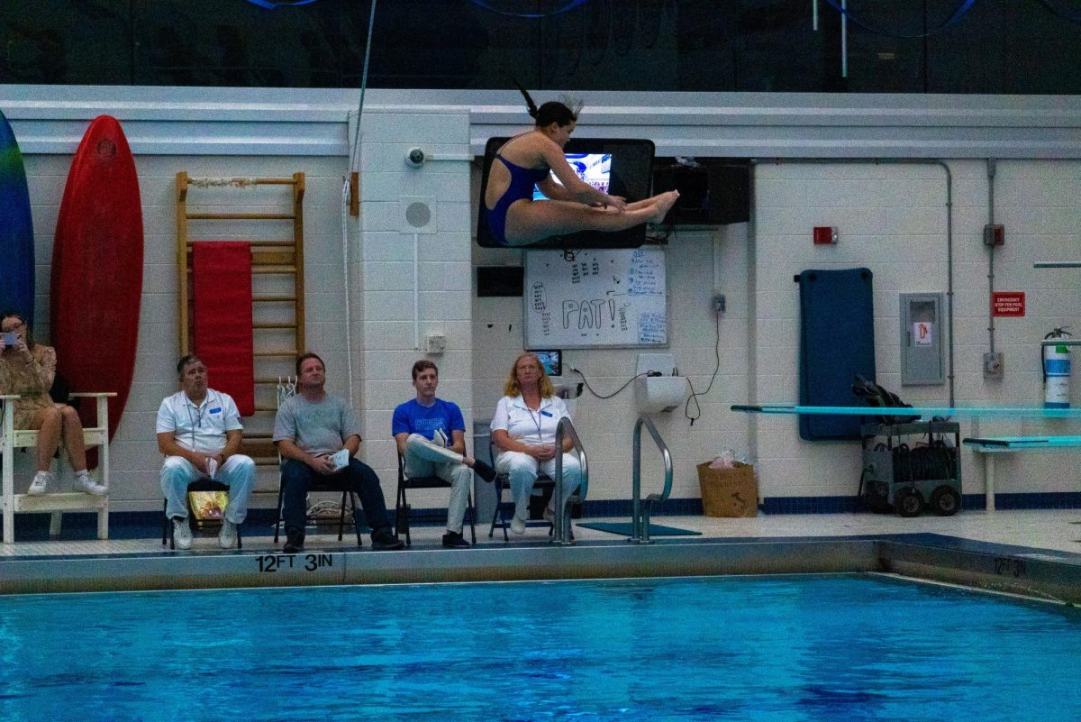 Livy Tran dives at Senior Night on Oct. 18.