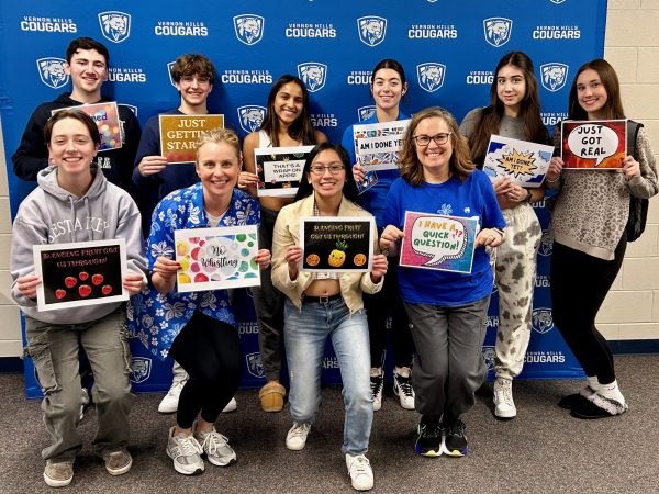 During the CRCelebration-That’s a Wrap on Apps event, Nicole Carson and last year's seniors pose for a picture.