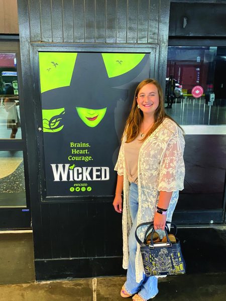 Myra Crowe poses for a picture before going to watch "Wicked" on Broadway.