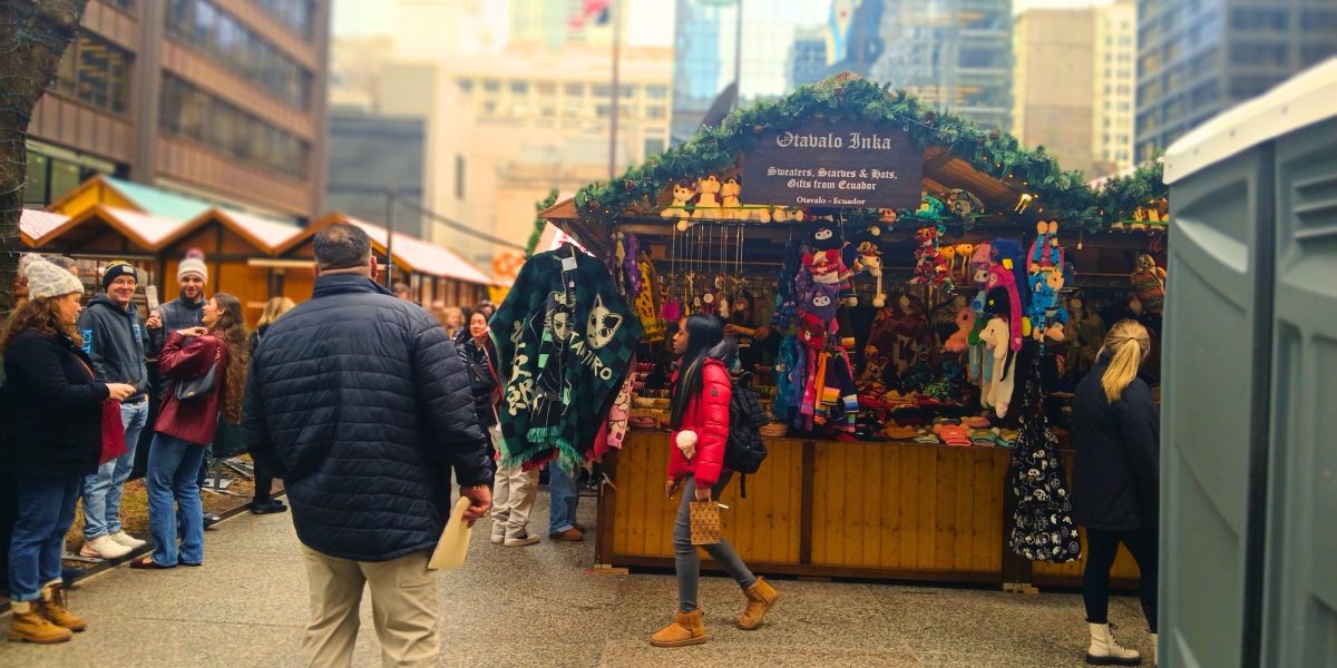 Vistors walk around Christkindlmarket at Daley Plaza in Chicago, an annual German Christmas event.