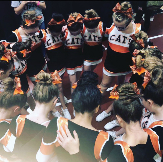 My team and I huddle during my freshman year at the first State competition I attended.